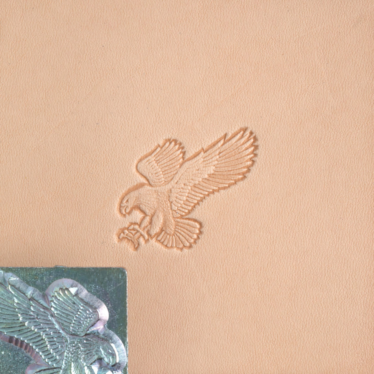 Attack eagle leather stamp with its impression.