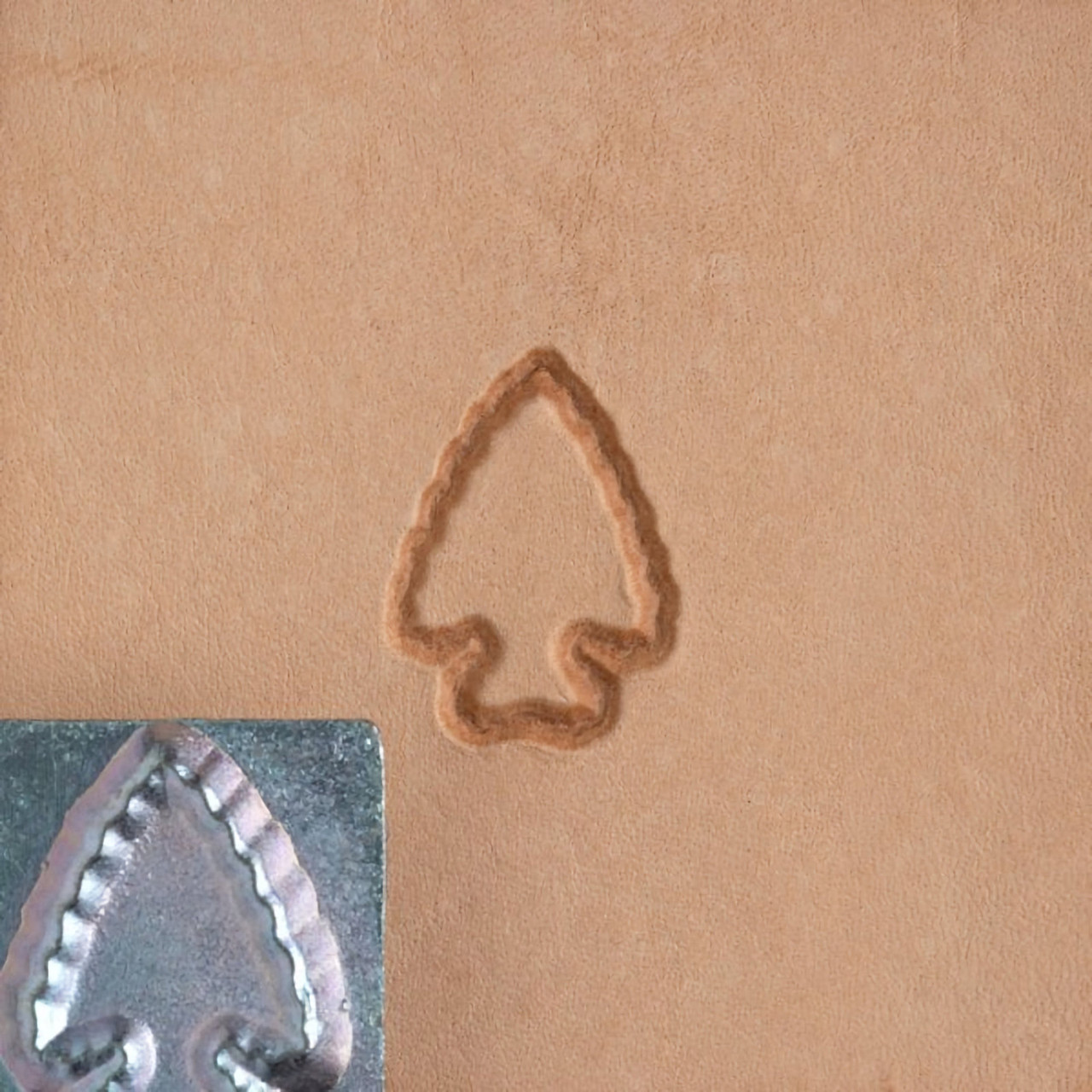 Arrowhead stamp with leather impression.