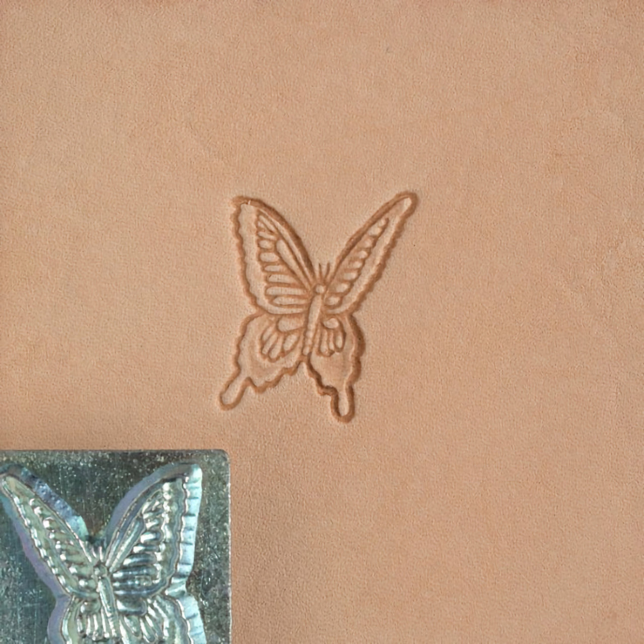 Butterfly stamp with its leather impression.