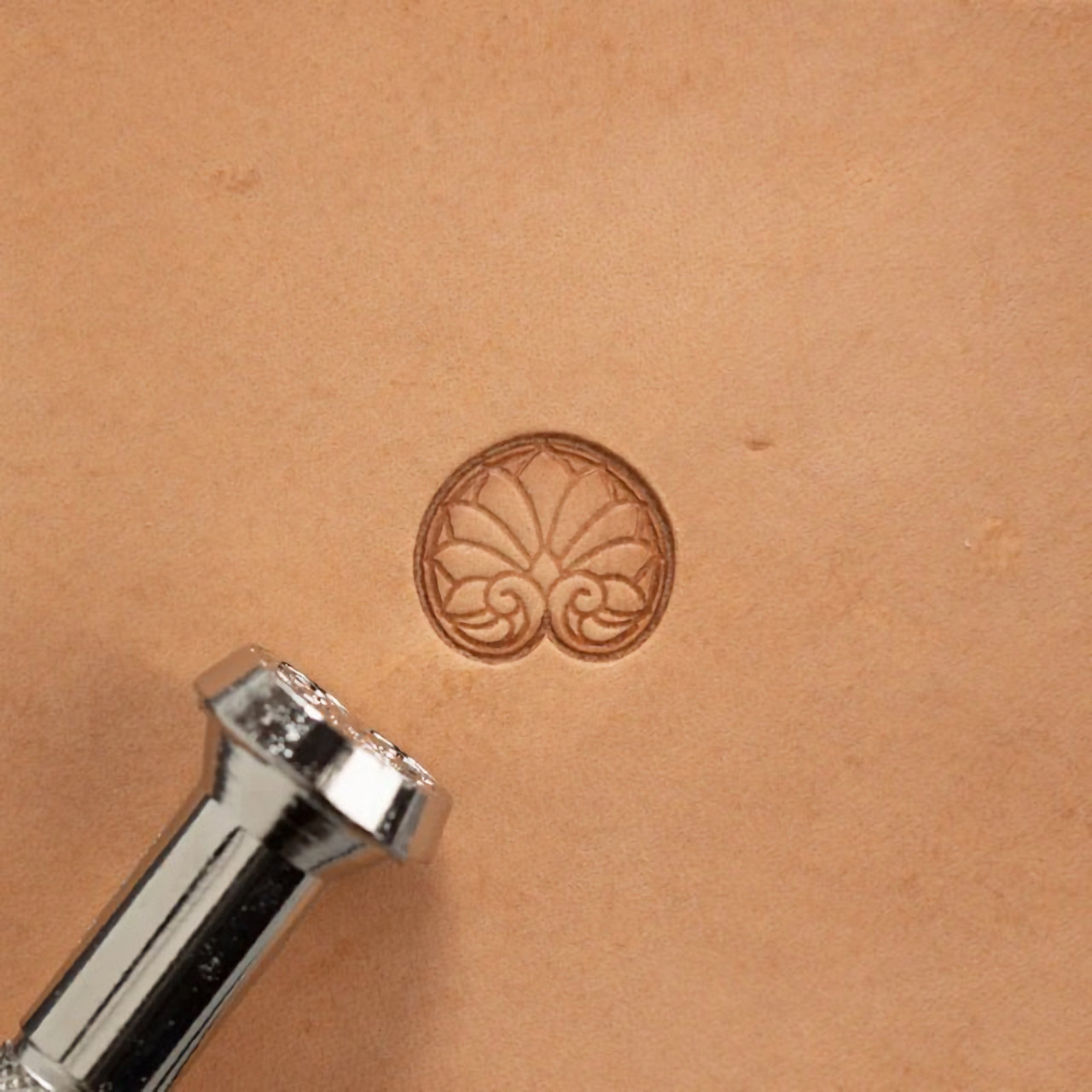 66145-00 leather stamp with its impression.