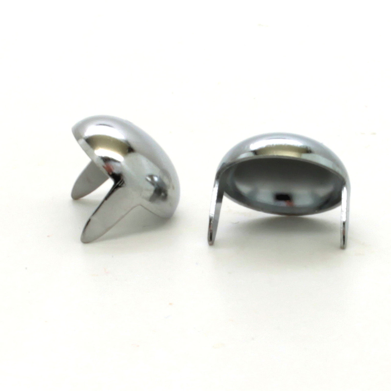 Chrome plated brass 1/2" leather craft spots back facing. Chrome plated brass 1/2" leather craft spots back facing.