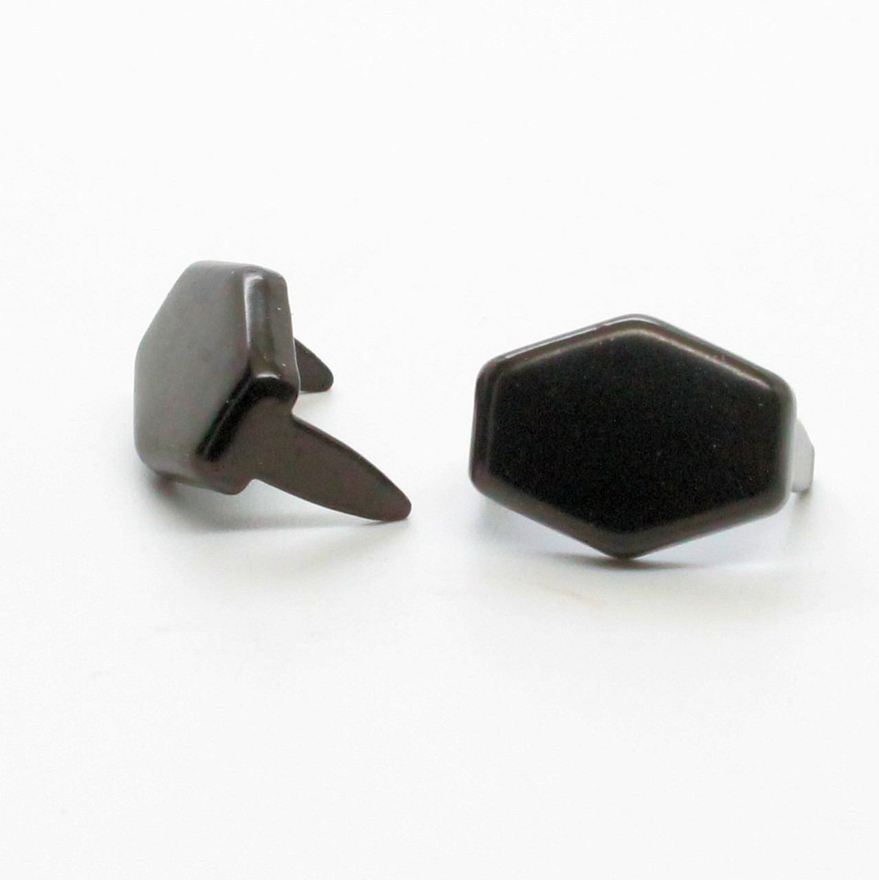 Front of a black hexagon leather craft spot in 5/8".