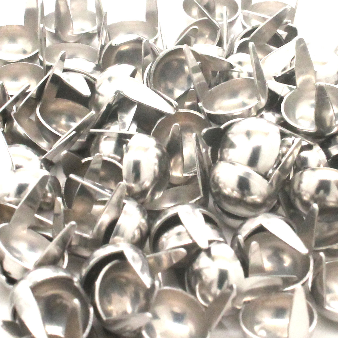 Saddle stainless steel spots in 3/8" diameter in bulk.