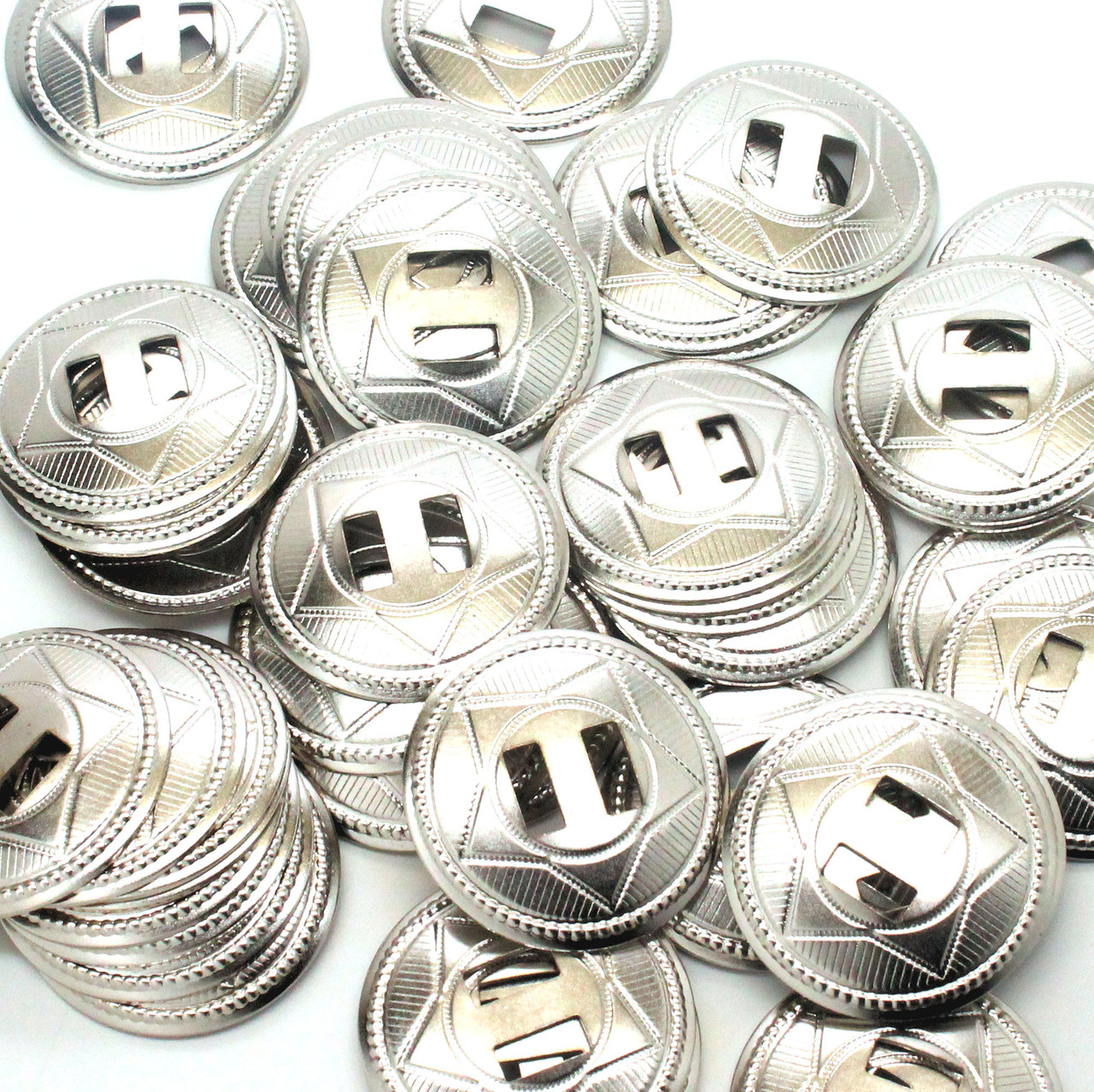 Bulk picture of a 100 pack silver slotted economy conchos.