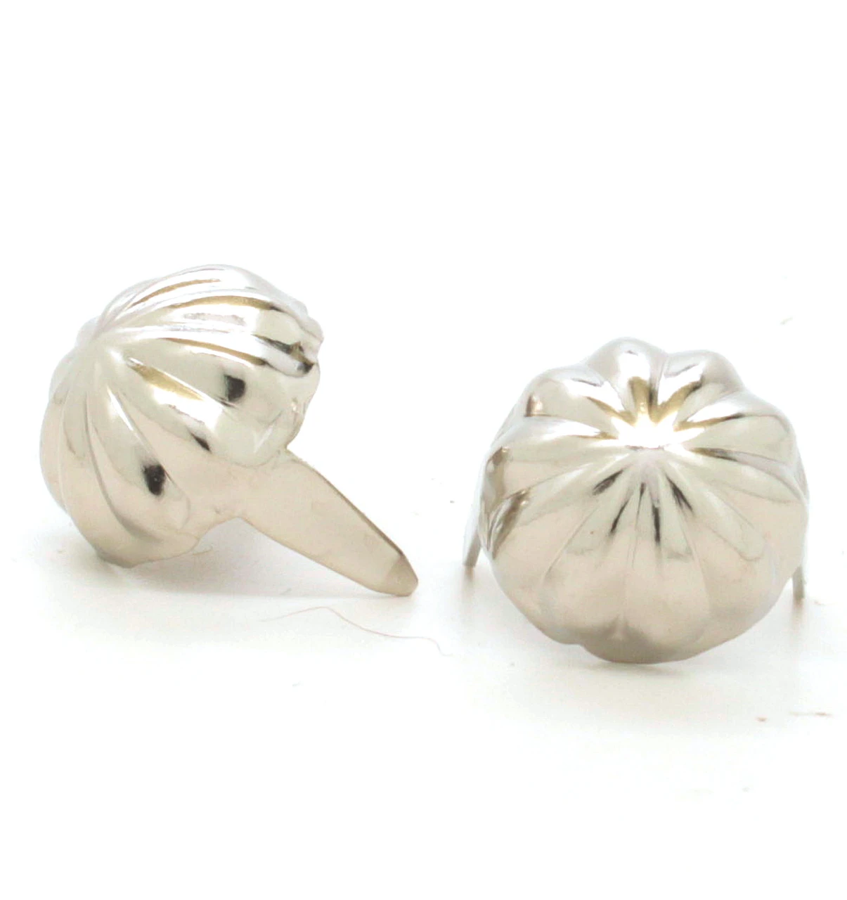 Brass and nickel parachute spot in 100 packs showing the fronts.