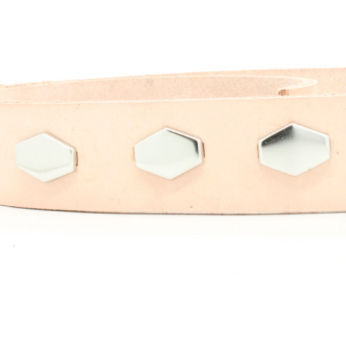 Hexagon leather spots on a belt. Hexagon leather spots on a belt.