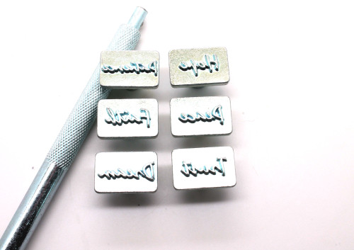 6 piece stamp set with handle. 6 piece stamp set with handle.
