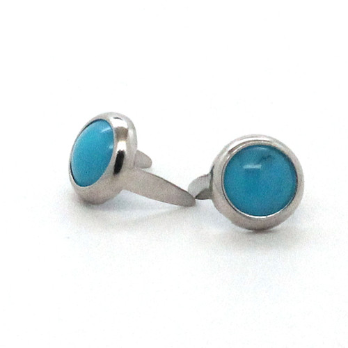 Blue spots with nickel rims in 5/16" diameter frontside.
