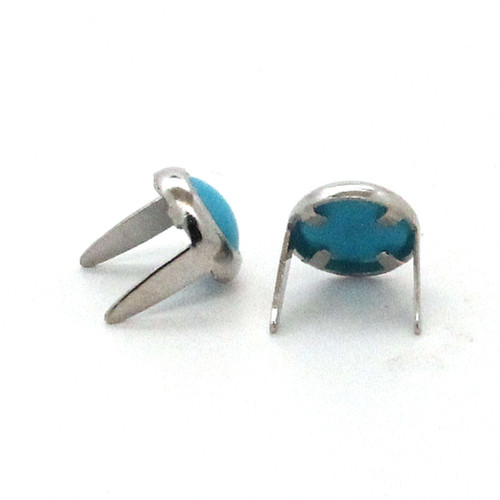 Blue spots with nickel rims in 5/16" diameter backside.