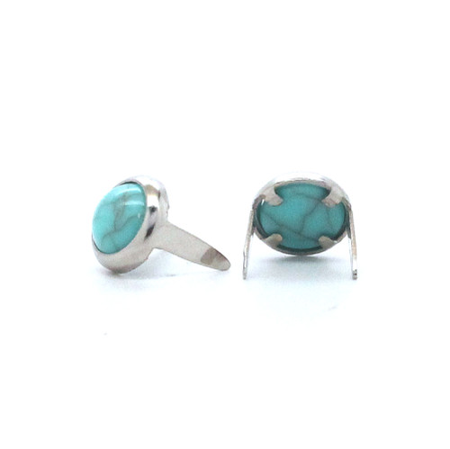 Turquoise spots with nickel rims in 5/16" diameter backside.