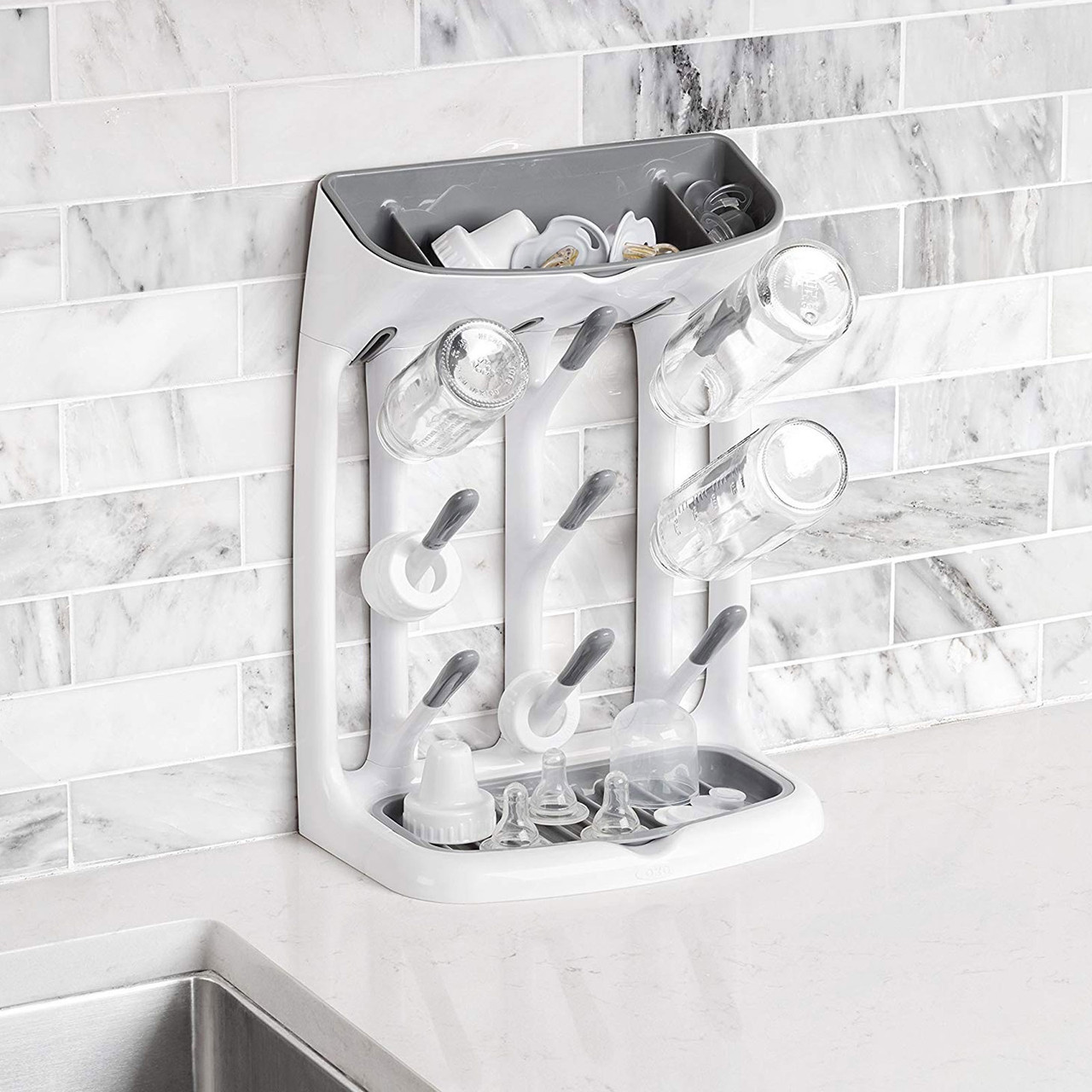 https://cdn11.bigcommerce.com/s-fh6ws/images/stencil/1280x1280/products/3594/14271/Oxo_Tot_Space_Saving_Peg_Bottle_Drying_Rack__67146.1631842305.jpg?c=3