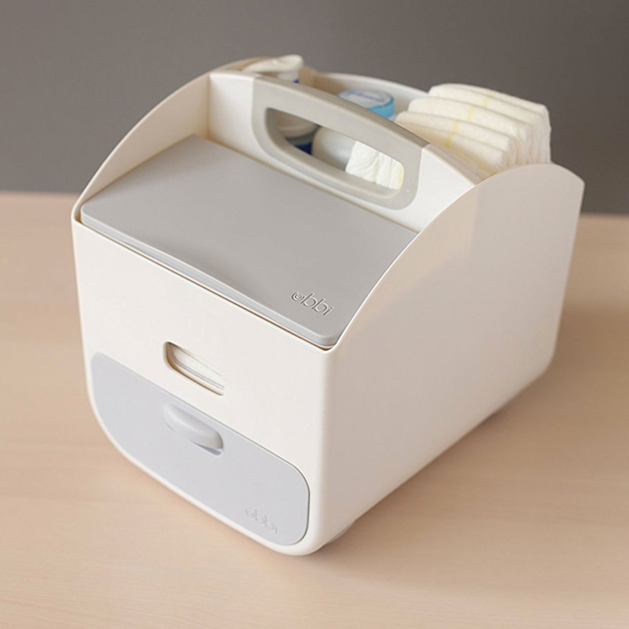 Grey Ubbi Diaper Caddy. Shop baby changing supplies online