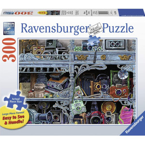 Ravensburger Camera Evolution 300pc puzzle showing completed camera history collage