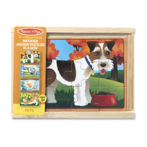 Child completing Melissa & Doug pets jigsaw puzzle