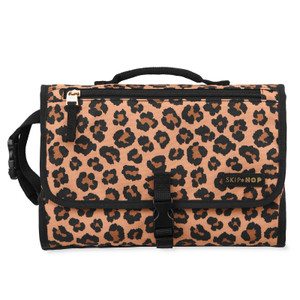 Skip Hop Pronto portable nappy changing station in leopard print with black trim, carry handle and adjustable strap