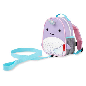 Skip Hop purple narwhal mini backpack with safety harness leash, pink and turquoise straps on white background
