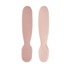 BEABA silicone baby pre-spoons in pink tones, showing textured and smooth sides with ergonomic handles