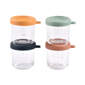 BEABA glass baby food storage jars with orange, sage green, black and terracotta lids stacked in pairs showing measurement