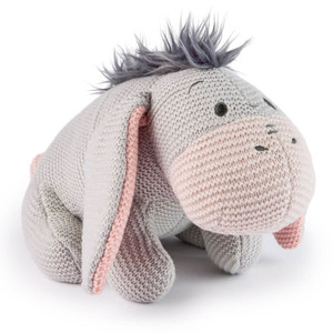 Disney x Gund knitted grey Eeyore plush toy with pink ears and tail, featuring characteristic tuft of dark hair on white