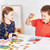 Orchard Toys Magic Maths Game components laid out including all cards and playing pieces