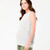 Pregnant woman wearing white and khaki striped sleeveless nursing tank top with green drawstring pants on white background