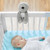 Skip Hop Cry-Activated Soother Sloth showing clip mechanism for cot and pram attachment