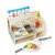 Child slicing wooden sandwich pieces with Melissa & Doug counter