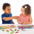 Orchard Toys Smelly Wellies Game in play showing matching welly boot cards