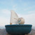PlanToys Polar Bear Sailing Boat floating in bath