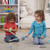 Two children playing side by side with Catch and Count Fishing Rod Set