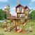 Sylvanian Families multi-level treehouse playset with red roof, multiple animal figures positioned throughout platforms, slide, swing and outdoor scenery background.