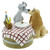 Disney Lady and the Tramp figurine featuring beige and grey dogs at checkered picnic table with candle and plate
