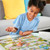 Orchard Toys My First Snakes and Ladders - playing pieces and dice in bright colours