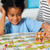 Orchard Toys My First Snakes and Ladders full game contents spread out