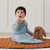 ergoPouch Organic Jersey Sleeping Bag 3.5 TOG Dragonflies worn by baby