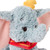 Disney x GUND Cozys Dumbo held up showing multi-texture sensory fabrics