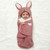 Baby GUND Oh So Snuggly Bunny Wrap Blanket - feature detail view | Peekaboobaby