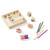 Melissa & Doug Friendship Stamp Set - overhead display of all 8 wooden stamps scattered, open 2-colour inkpad, 5 pencils and stamped artwork | Peekaboobaby