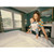 Ergobaby Omni Classic Mesh Baby Carrier Luminous Ivory - mother carrying baby while making bed in teal-walled bedroom