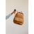 Beaba Tokyo Nappy Backpack, colour: Ochre nappy backpack - lifestyle - parent carrying the bag