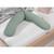 Theraline Original Maternity Pillow Melange Green Grey Bamboo displayed flat on white bedding with wooden bed frame
