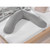 Theraline Original Maternity Pillow Melange Mid Grey Bamboo displayed flat on white bedding with wooden bed frame