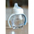 Beaba windy blue bottle assembled with handles, filled with water on surface
