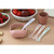 Beaba silicone spoons 4-pack with bowls and fresh produce on wooden surface