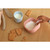 Beaba 2nd stage silicone spoon in cotton candy pink, angled flat view
