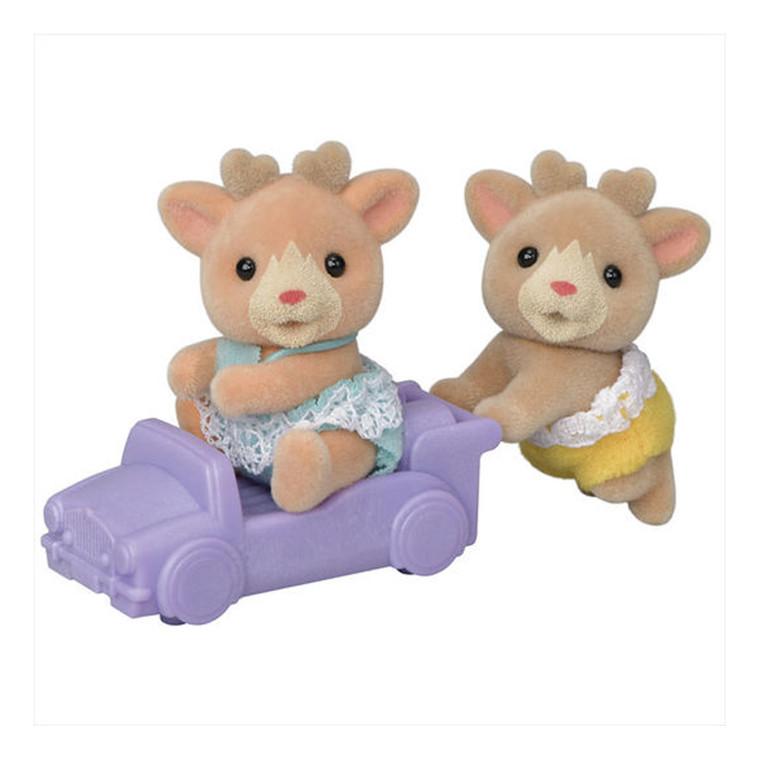 Sylvanian Families Reindeer Twins flocked figures with pink ears, one sitting in purple toy car, one wearing yellow outfit