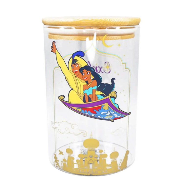 Disney Aladdin glass storage jar with golden lid featuring Jasmine and Aladdin on magic carpet design with palace silhouette