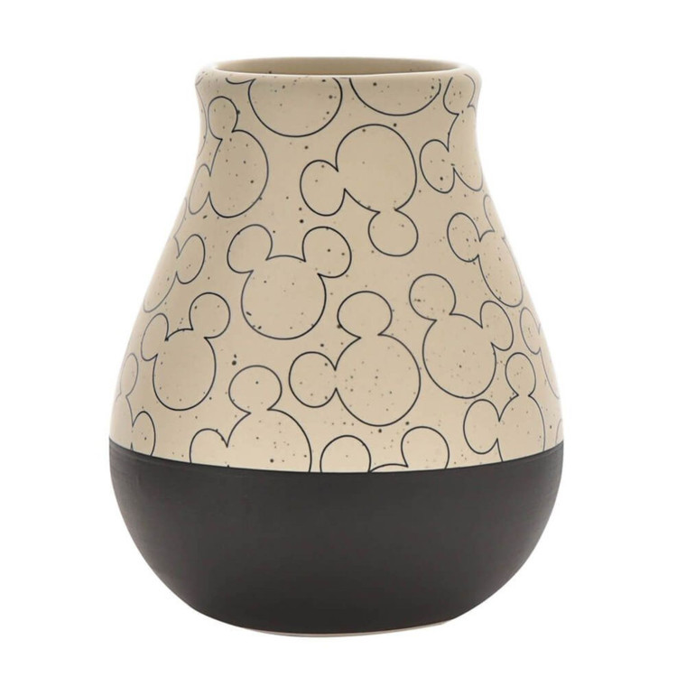 Disney beige ceramic vase with Mickey Mouse silhouette pattern and dark brown dipped base on white background