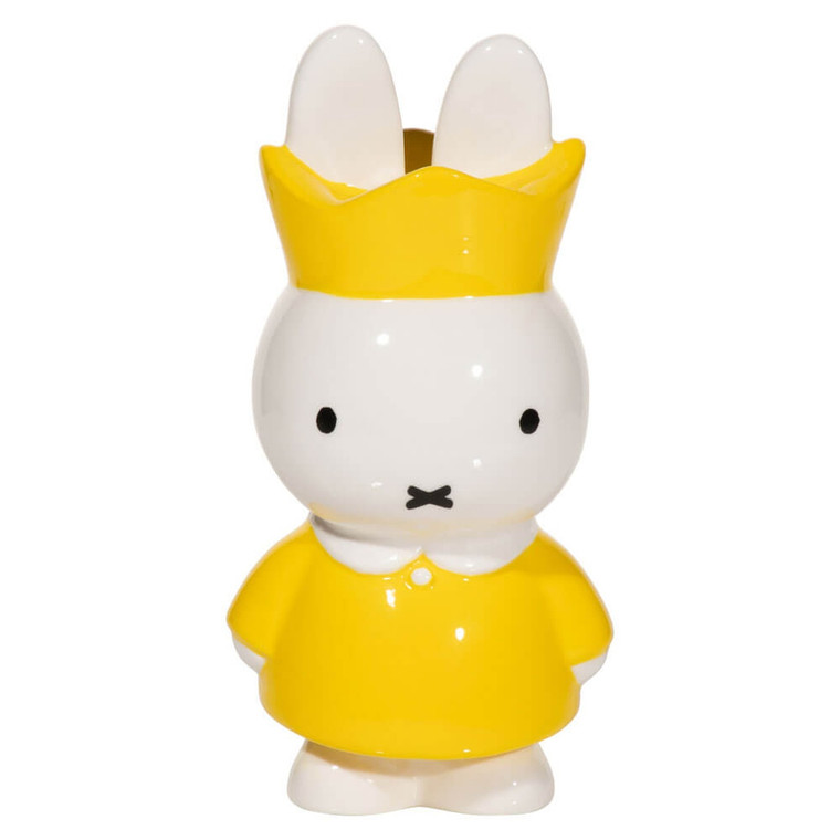 Ceramic Miffy figurine wearing a yellow crown and yellow dress by Dick Bruna