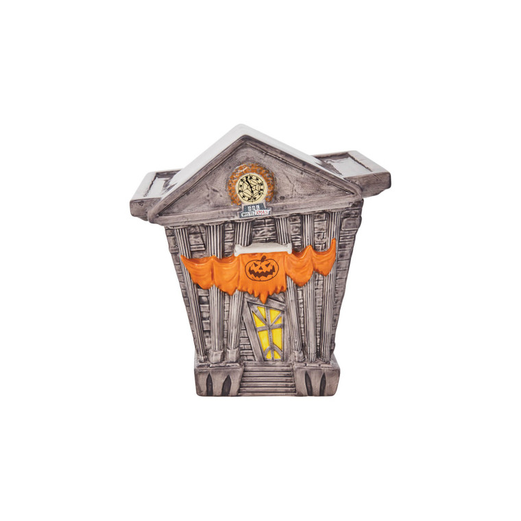 Halloween Town City Hall ceramic cookie jar with grey stone facade, orange pumpkin banner and lit yellow windows